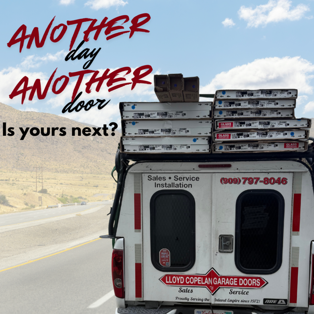 A Lloyd Copelan Garage Doors service truck loaded with Clopay door boxes driving on a highway toward an installation. Text overlay reads: Another Day, Another Door. Is yours next?