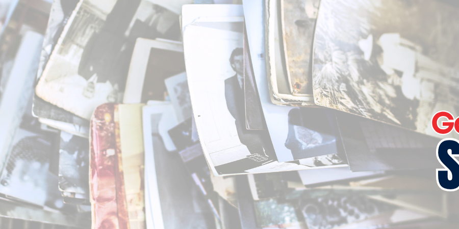 A vintage box filled with old family photographs next to a bold graphic that reads Garage Door Services Since 1972.