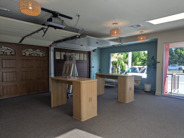 Lloyd Copelan Garage Doors showroom with full-size operating doors and consultation tables