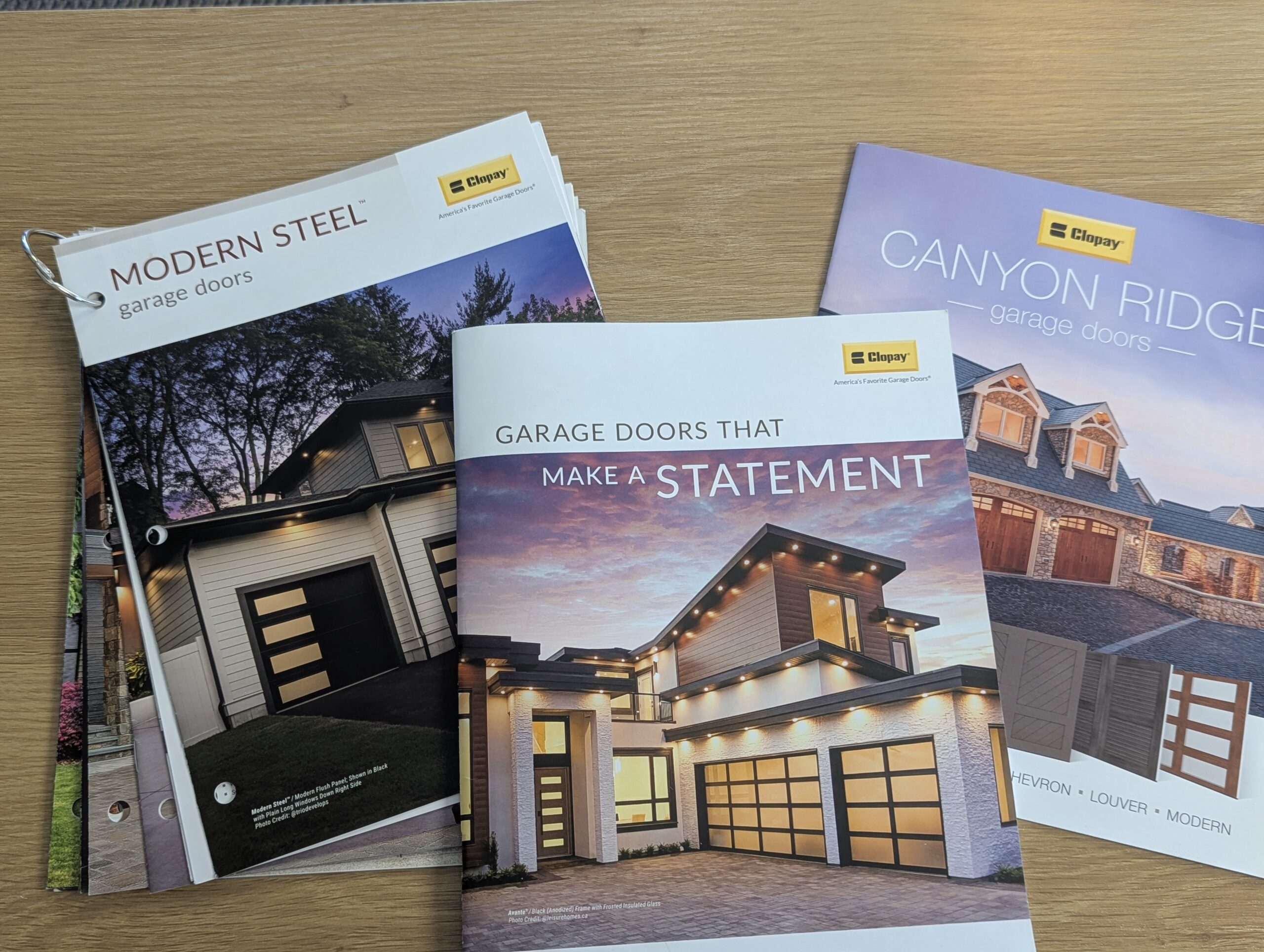 Clopay garage door design brochures available to compare in the showroom