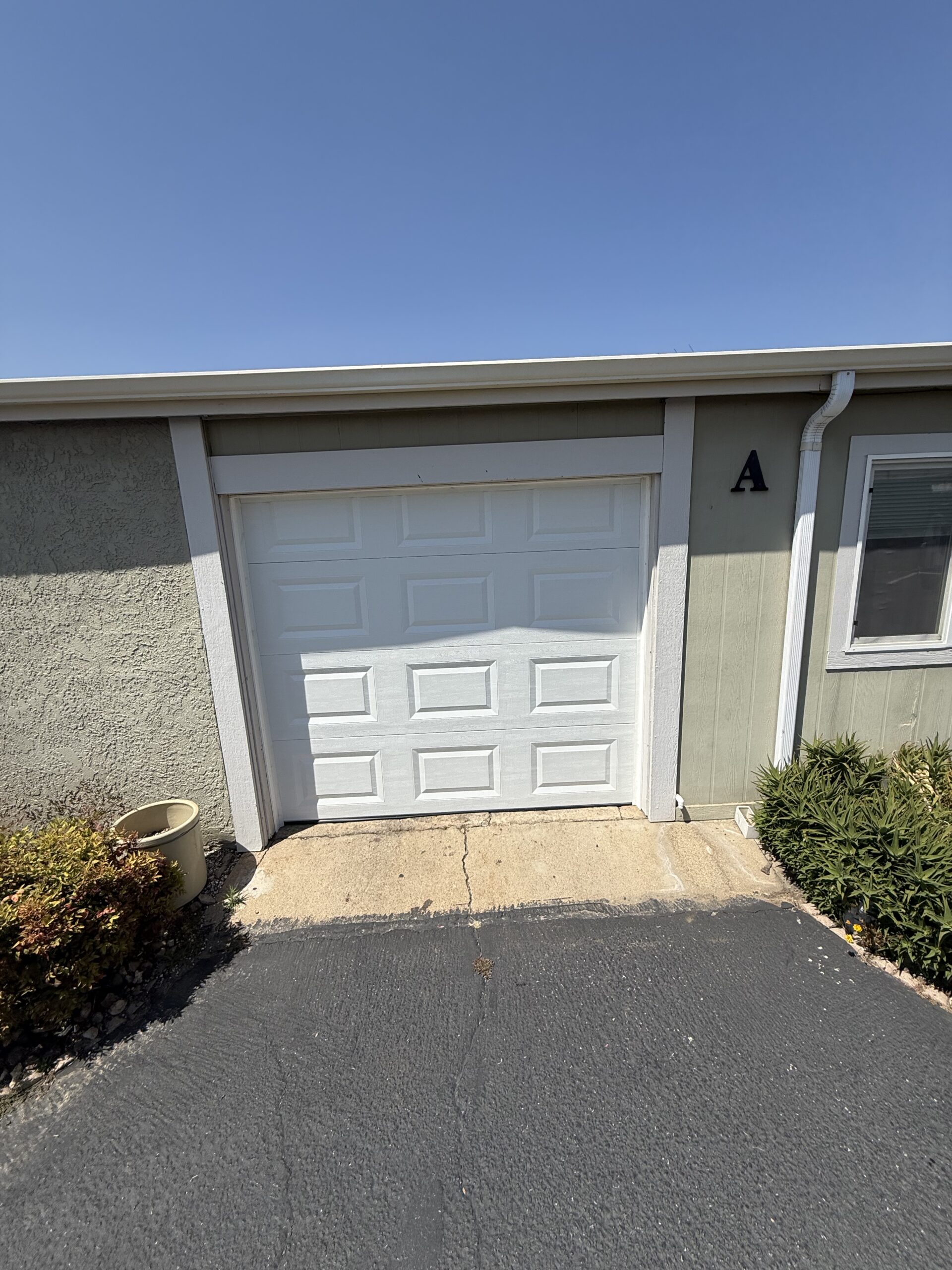 After: refreshed Classic Steel Value garage door at a Yucaipa home.